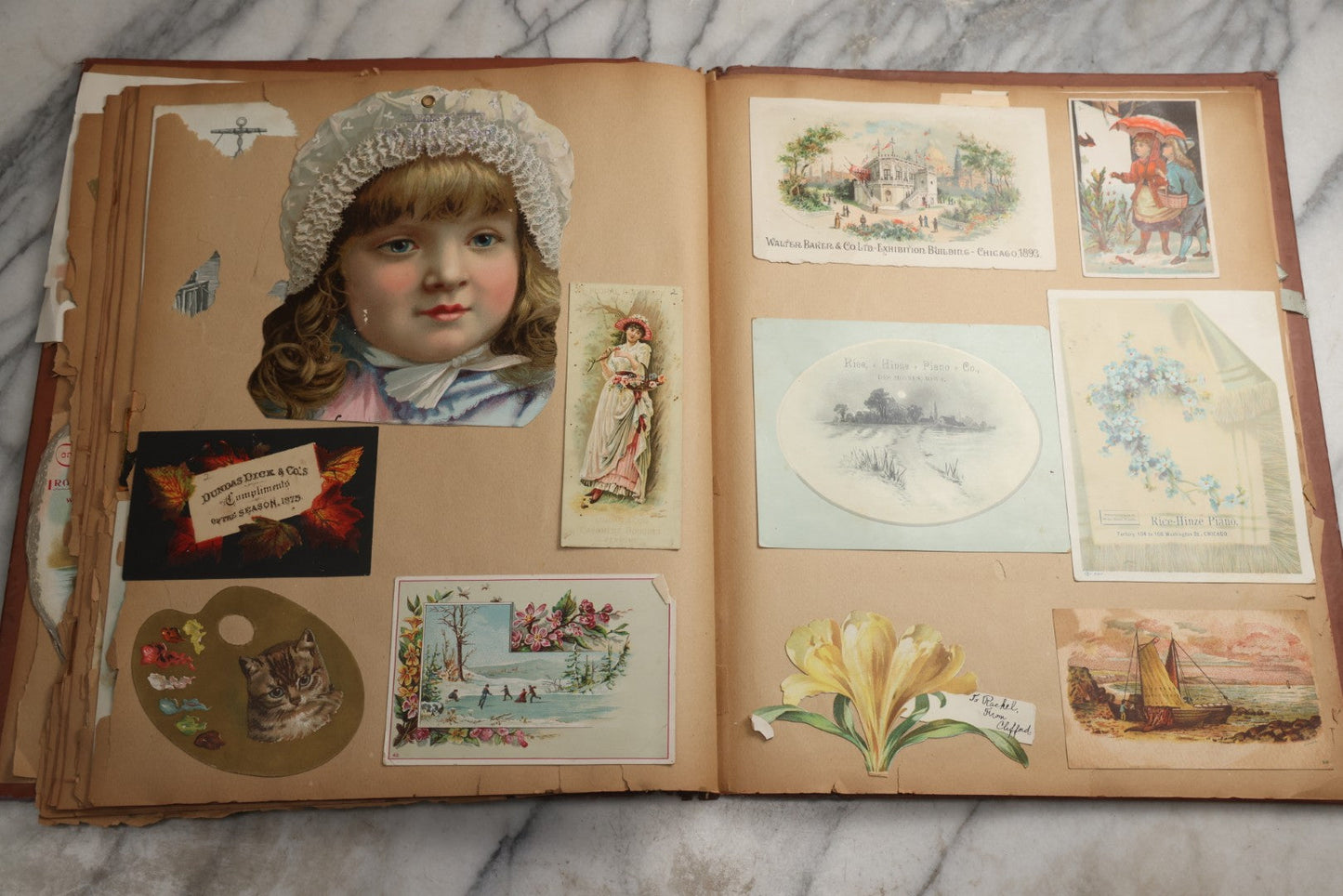Lot 078 - Antique Scrapbook Album With Gold Embossed Deer In Forest And Pasted Gypsy Woman Chromolithograph On Cover, 150+ Victorian Trade Cards, Die Cuts, Children, Pets And Women's Fashion, Circa 1898