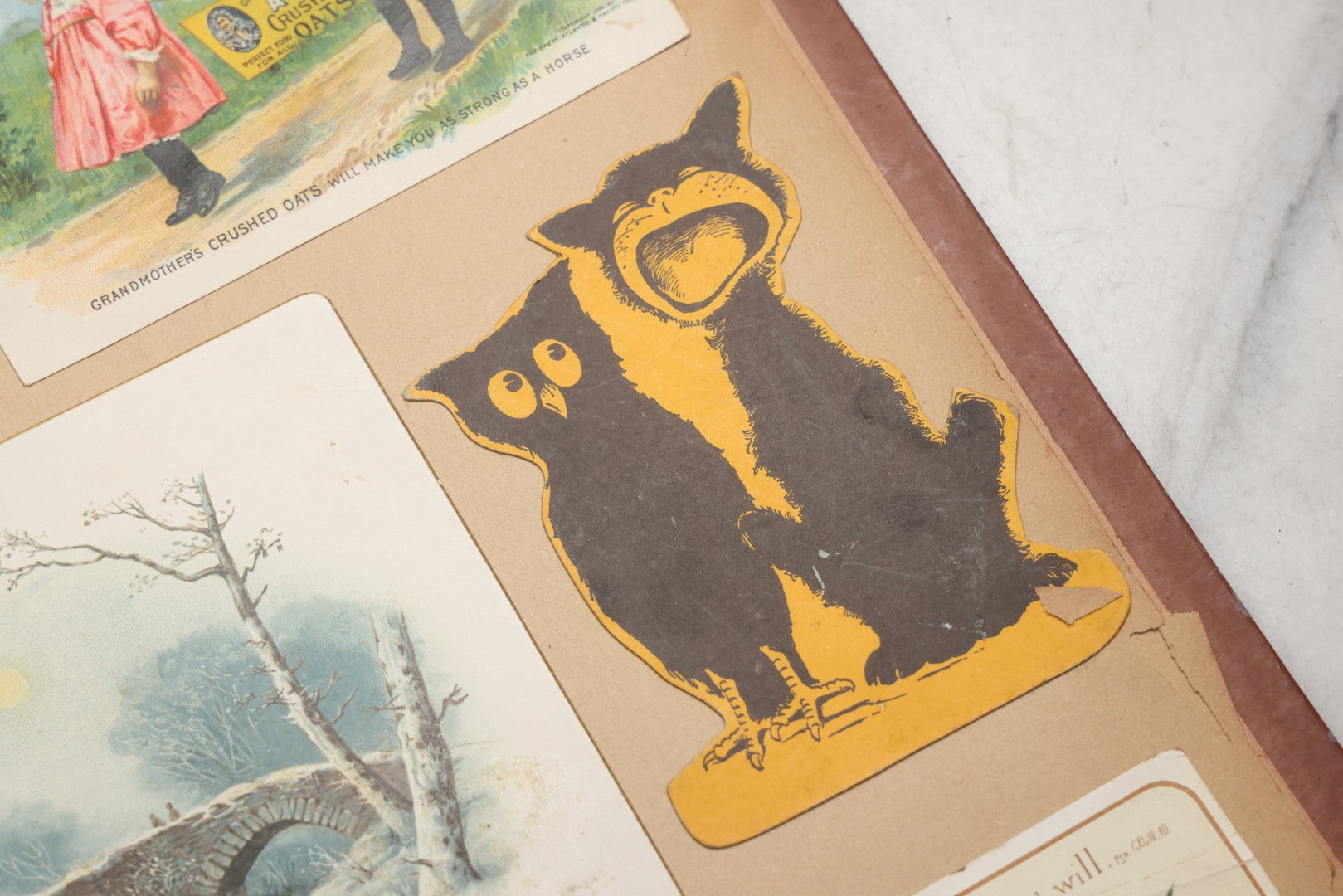 Lot 078 - Antique Scrapbook Album With Gold Embossed Deer In Forest And Pasted Gypsy Woman Chromolithograph On Cover, 150+ Victorian Trade Cards, Die Cuts, Children, Pets And Women's Fashion, Circa 1898