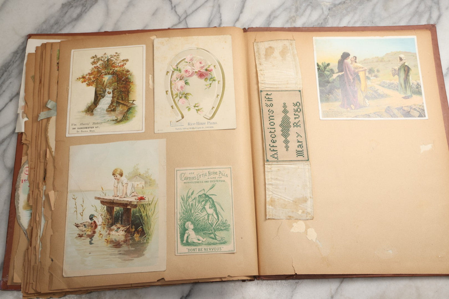 Lot 078 - Antique Scrapbook Album With Gold Embossed Deer In Forest And Pasted Gypsy Woman Chromolithograph On Cover, 150+ Victorian Trade Cards, Die Cuts, Children, Pets And Women's Fashion, Circa 1898