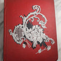 Lot 079 - Antique Red Scrapbook Album With Silver Painted Embossed Decorations, Hamburg, Stockholm, Paris, England, Stratford-On-Avon, Scotland, Liverpool Ephemera, Two Full Spreads Homemade Herbarium, Circa 1896