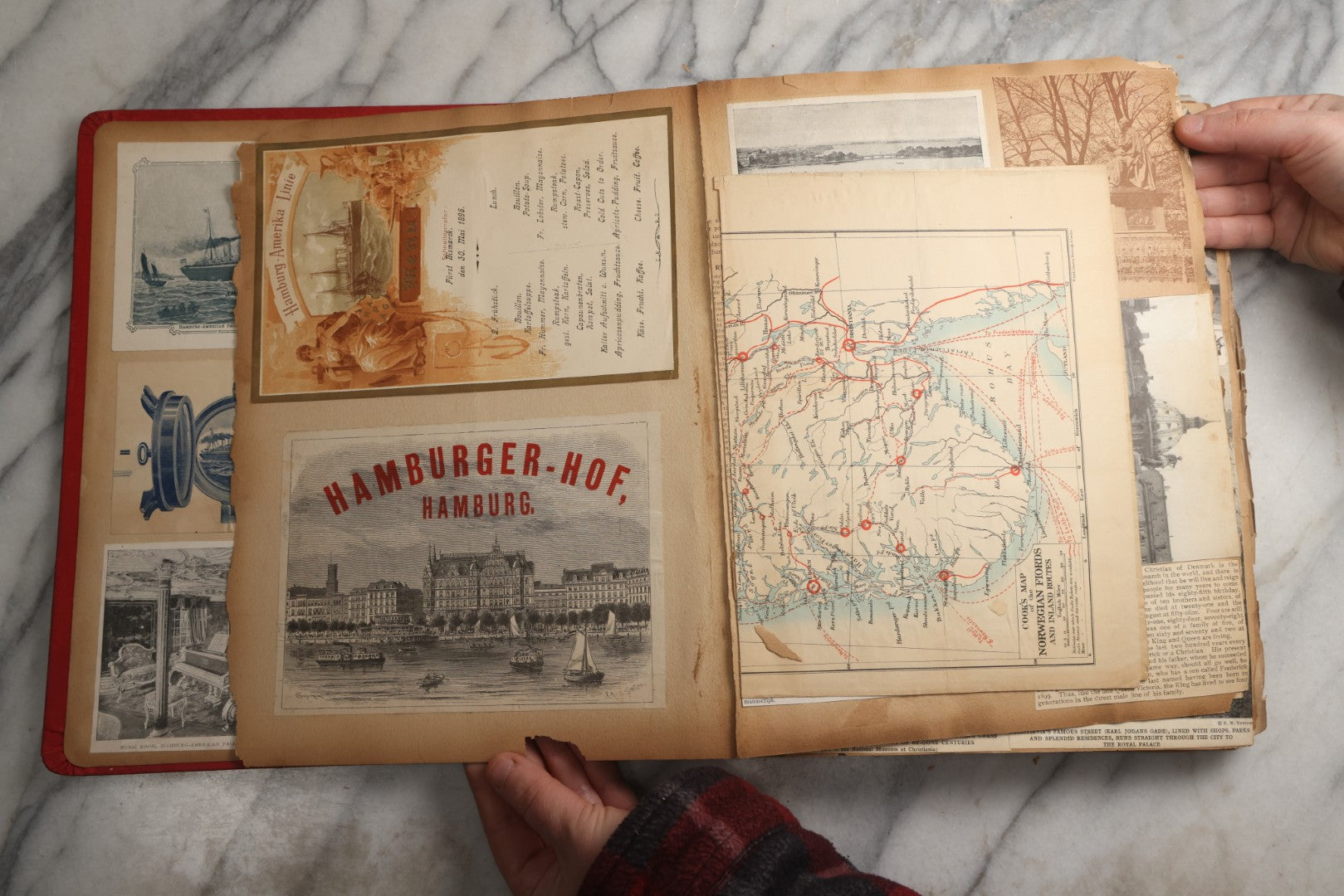 Lot 079 - Antique Red Scrapbook Album With Silver Painted Embossed Decorations, Hamburg, Stockholm, Paris, England, Stratford-On-Avon, Scotland, Liverpool Ephemera, Two Full Spreads Homemade Herbarium, Circa 1896
