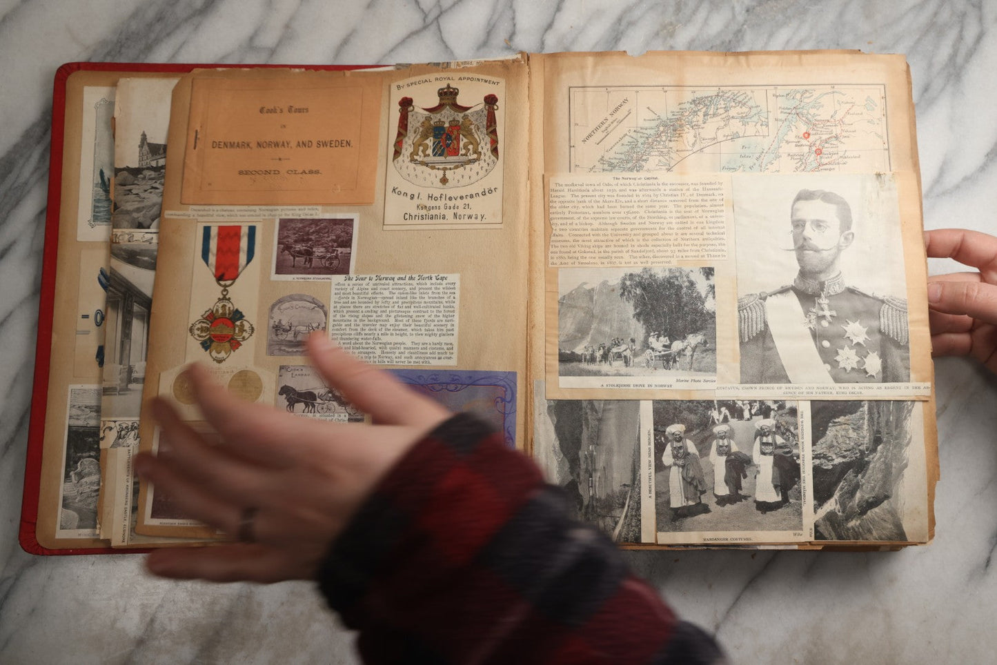 Lot 079 - Antique Red Scrapbook Album With Silver Painted Embossed Decorations, Hamburg, Stockholm, Paris, England, Stratford-On-Avon, Scotland, Liverpool Ephemera, Two Full Spreads Homemade Herbarium, Circa 1896