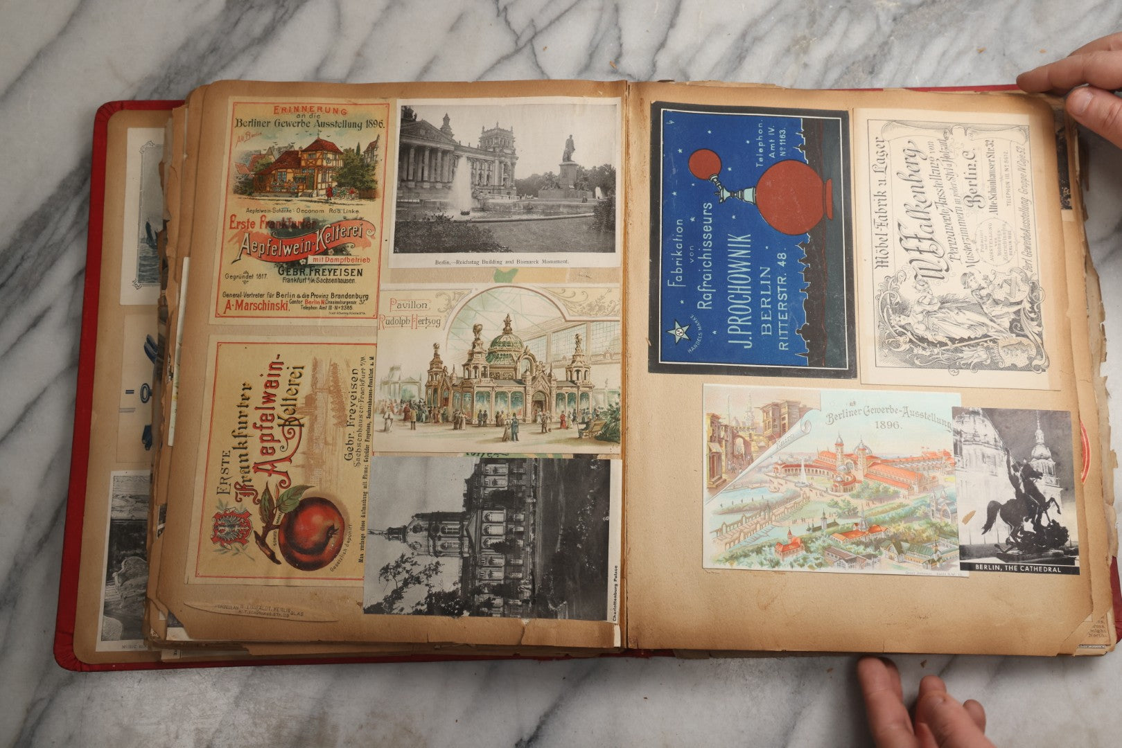 Lot 079 - Antique Red Scrapbook Album With Silver Painted Embossed Decorations, Hamburg, Stockholm, Paris, England, Stratford-On-Avon, Scotland, Liverpool Ephemera, Two Full Spreads Homemade Herbarium, Circa 1896
