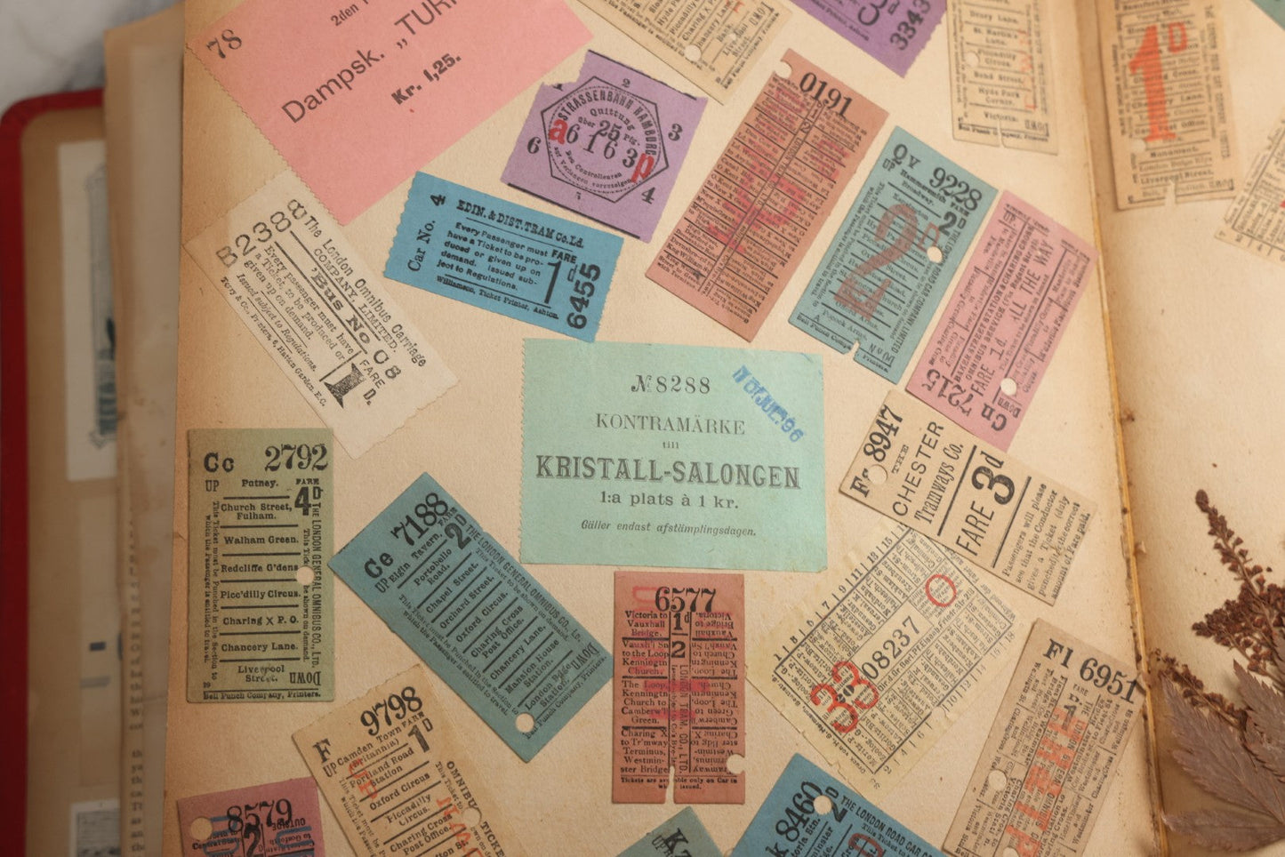 Lot 079 - Antique Red Scrapbook Album With Silver Painted Embossed Decorations, Hamburg, Stockholm, Paris, England, Stratford-On-Avon, Scotland, Liverpool Ephemera, Two Full Spreads Homemade Herbarium, Circa 1896