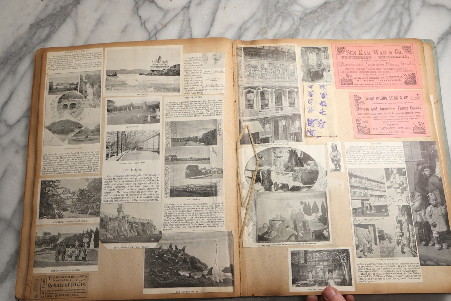 Lot 080 - Antique Light Blue Scrapbook Album With Silver Painted Embossed Decorations, California, San Francisco Chinatown, Oakland, Yosemite Ephemera, Homemade Herbarium With Location Captions Including Yellowstone Park And Utah, Circa 1897