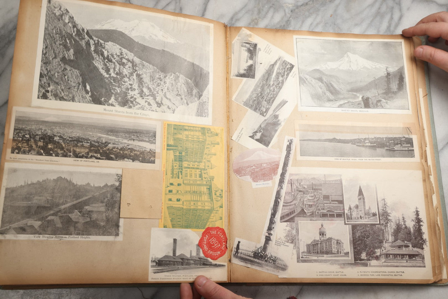 Lot 080 - Antique Light Blue Scrapbook Album With Silver Painted Embossed Decorations, California, San Francisco Chinatown, Oakland, Yosemite Ephemera, Homemade Herbarium With Location Captions Including Yellowstone Park And Utah, Circa 1897