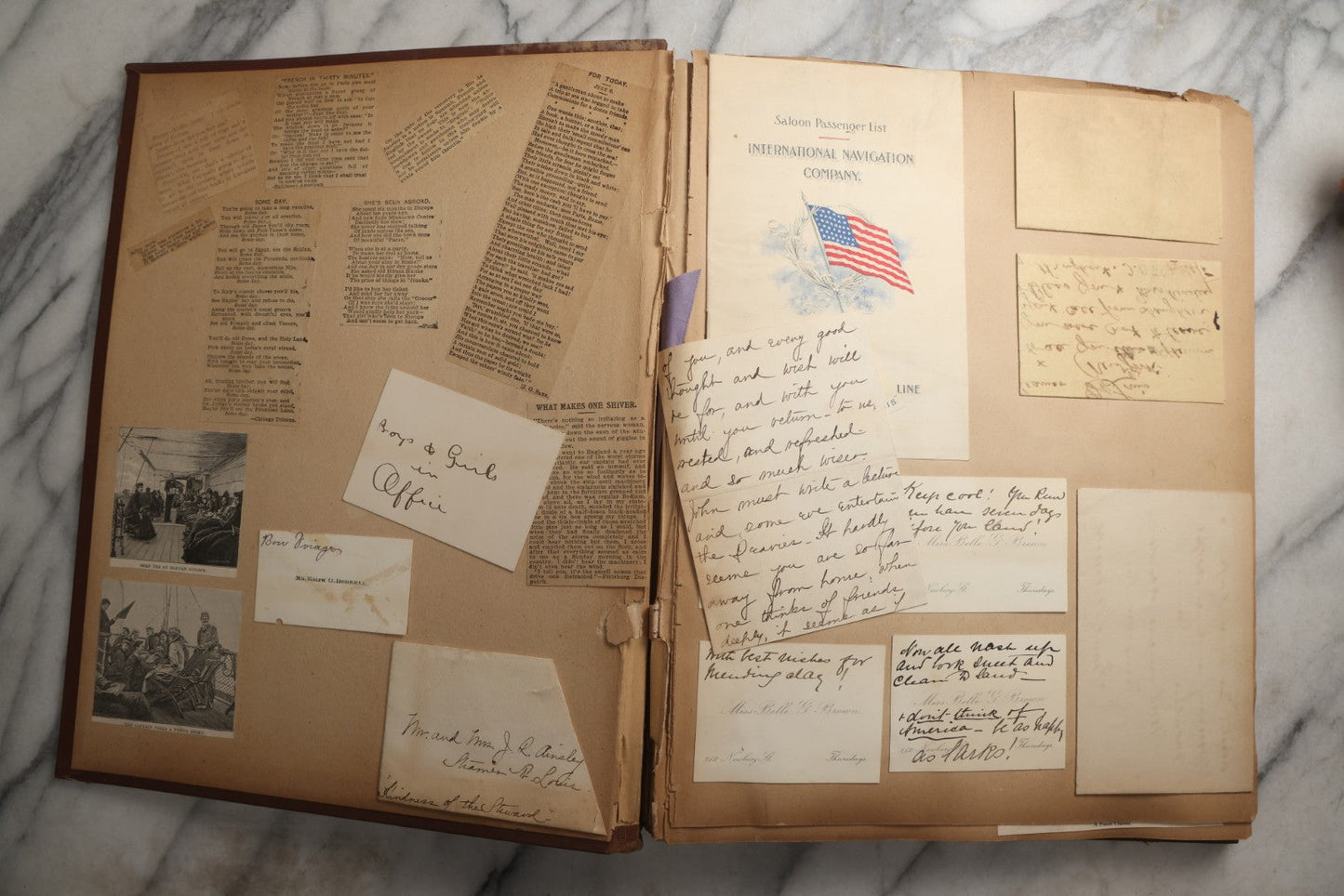 Lot 082 - Antique Brown Scrapbook Album With Gold Borders, European Travel Ephemera Including Touraine, Northern Spain, Holland, Wales, Thomas Cook Tickets, Hotel Menus, Postcards, Pressed Flowers, Circa 1901