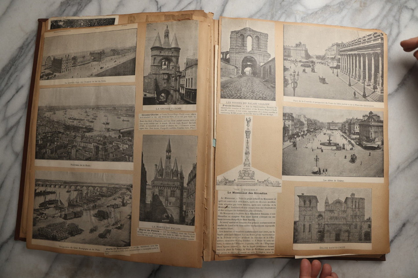Lot 082 - Antique Brown Scrapbook Album With Gold Borders, European Travel Ephemera Including Touraine, Northern Spain, Holland, Wales, Thomas Cook Tickets, Hotel Menus, Postcards, Pressed Flowers, Circa 1901