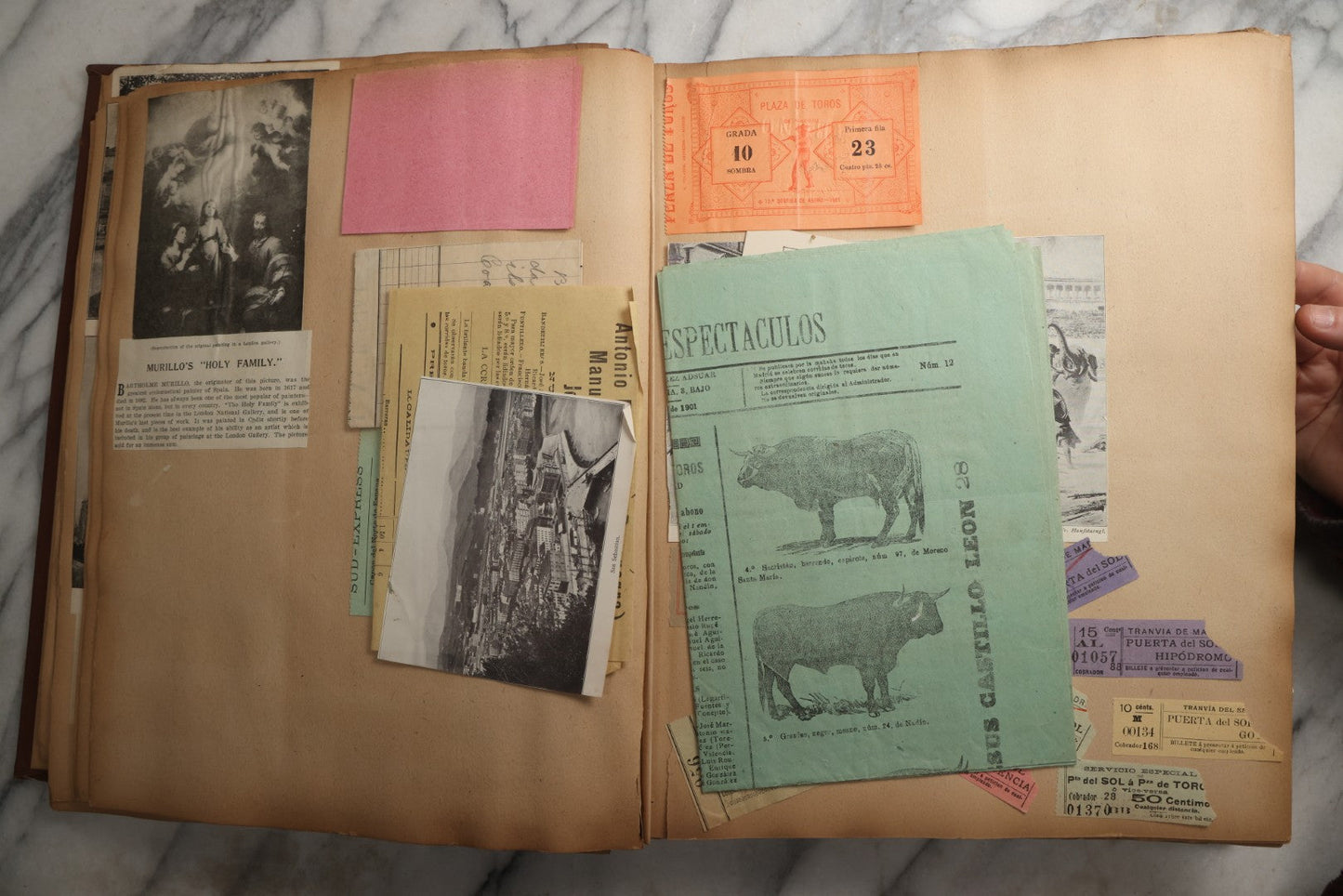 Lot 082 - Antique Brown Scrapbook Album With Gold Borders, European Travel Ephemera Including Touraine, Northern Spain, Holland, Wales, Thomas Cook Tickets, Hotel Menus, Postcards, Pressed Flowers, Circa 1901