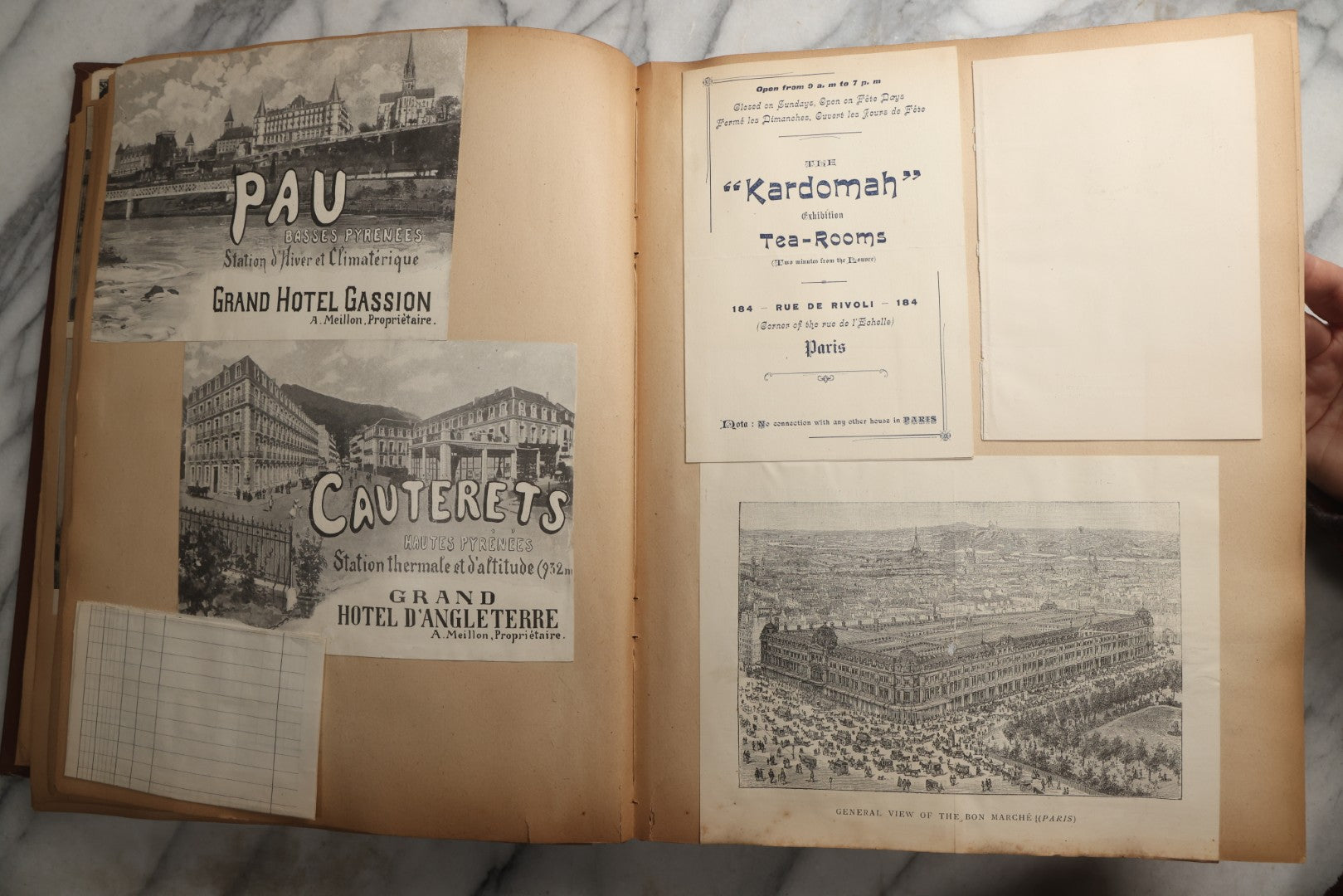 Lot 082 - Antique Brown Scrapbook Album With Gold Borders, European Travel Ephemera Including Touraine, Northern Spain, Holland, Wales, Thomas Cook Tickets, Hotel Menus, Postcards, Pressed Flowers, Circa 1901