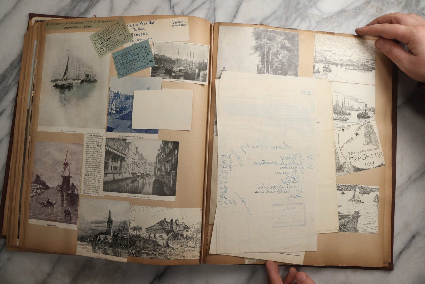 Lot 082 - Antique Brown Scrapbook Album With Gold Borders, European Travel Ephemera Including Touraine, Northern Spain, Holland, Wales, Thomas Cook Tickets, Hotel Menus, Postcards, Pressed Flowers, Circa 1901