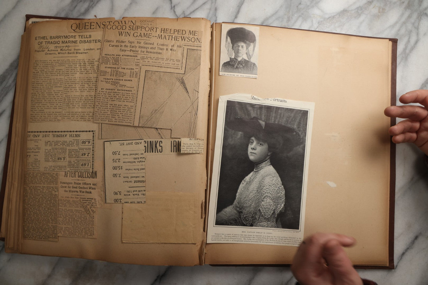 Lot 082 - Antique Brown Scrapbook Album With Gold Borders, European Travel Ephemera Including Touraine, Northern Spain, Holland, Wales, Thomas Cook Tickets, Hotel Menus, Postcards, Pressed Flowers, Circa 1901