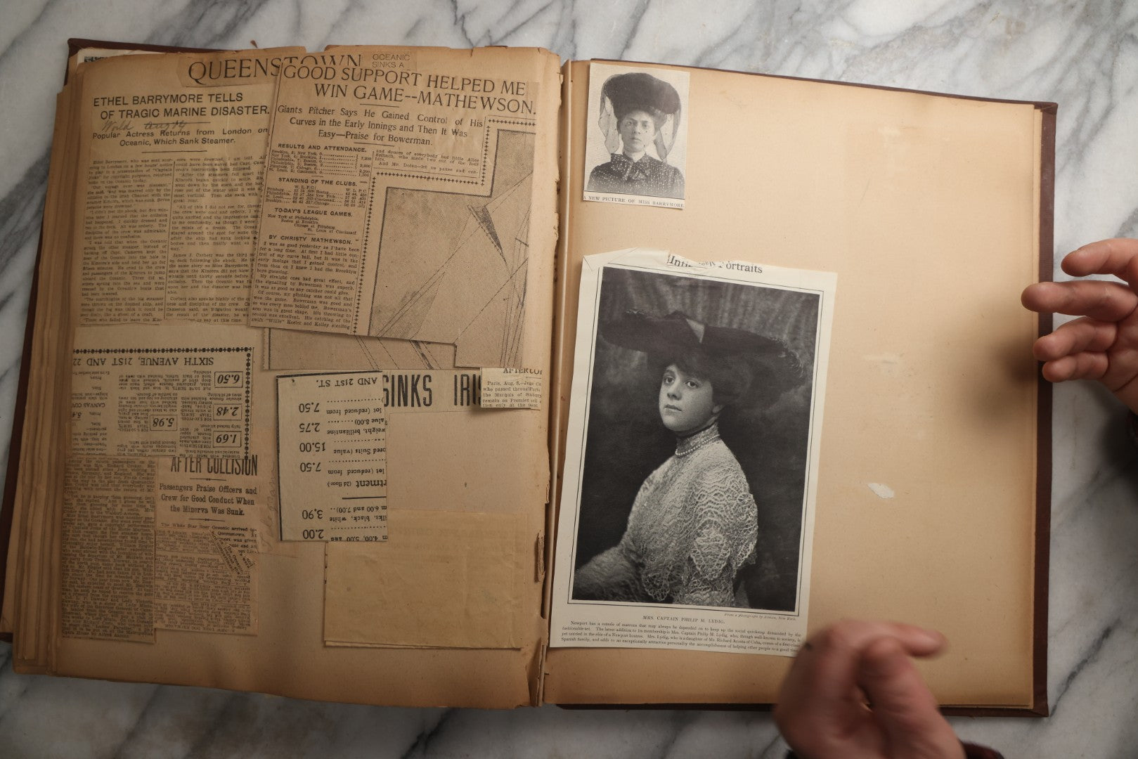 Lot 082 - Antique Brown Scrapbook Album With Gold Borders, European Travel Ephemera Including Touraine, Northern Spain, Holland, Wales, Thomas Cook Tickets, Hotel Menus, Postcards, Pressed Flowers, Circa 1901