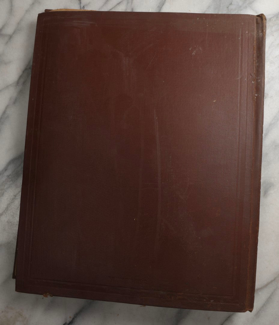 Lot 082 - Antique Brown Scrapbook Album With Gold Borders, European Travel Ephemera Including Touraine, Northern Spain, Holland, Wales, Thomas Cook Tickets, Hotel Menus, Postcards, Pressed Flowers, Circa 1901