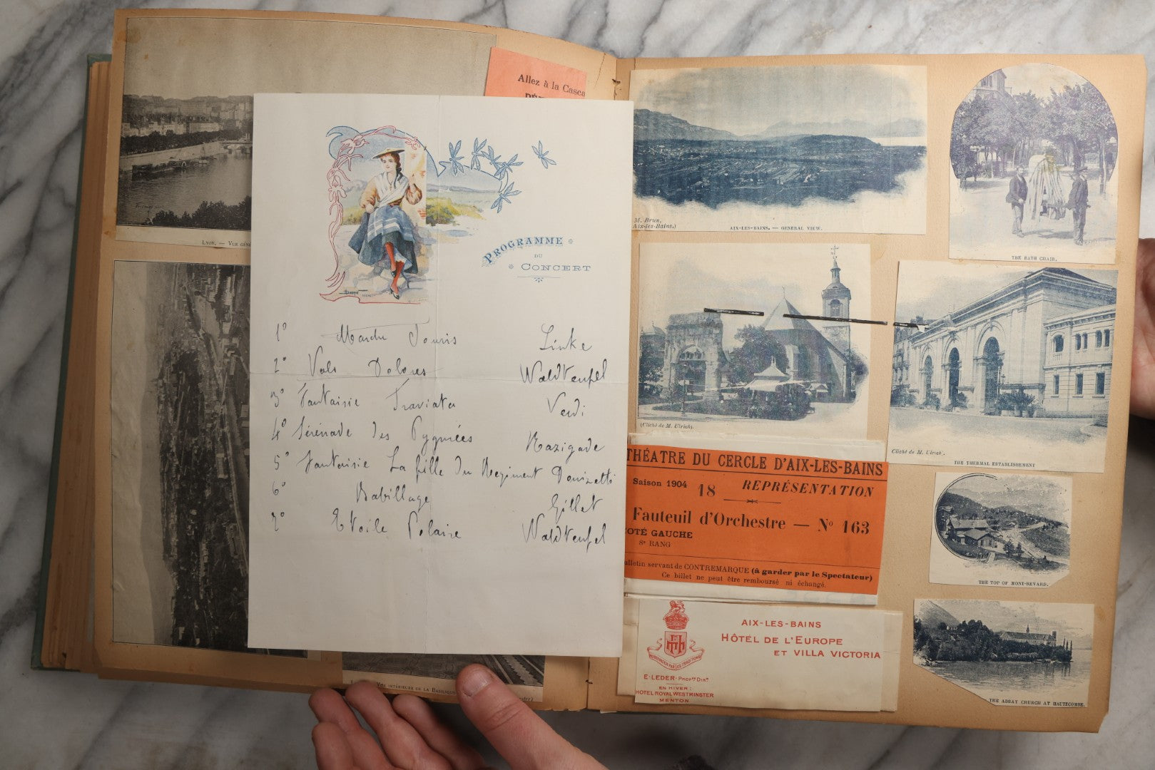 Lot 084 - Antique Light Blue "The Nonpareil" Scrapbook Album With Gold Lettering And Borders, Spain And England Travel Ephemera, Patent March 1876, Heavily Worn White Lettering Reads "Southern Spain And English Cathedrals 1904"