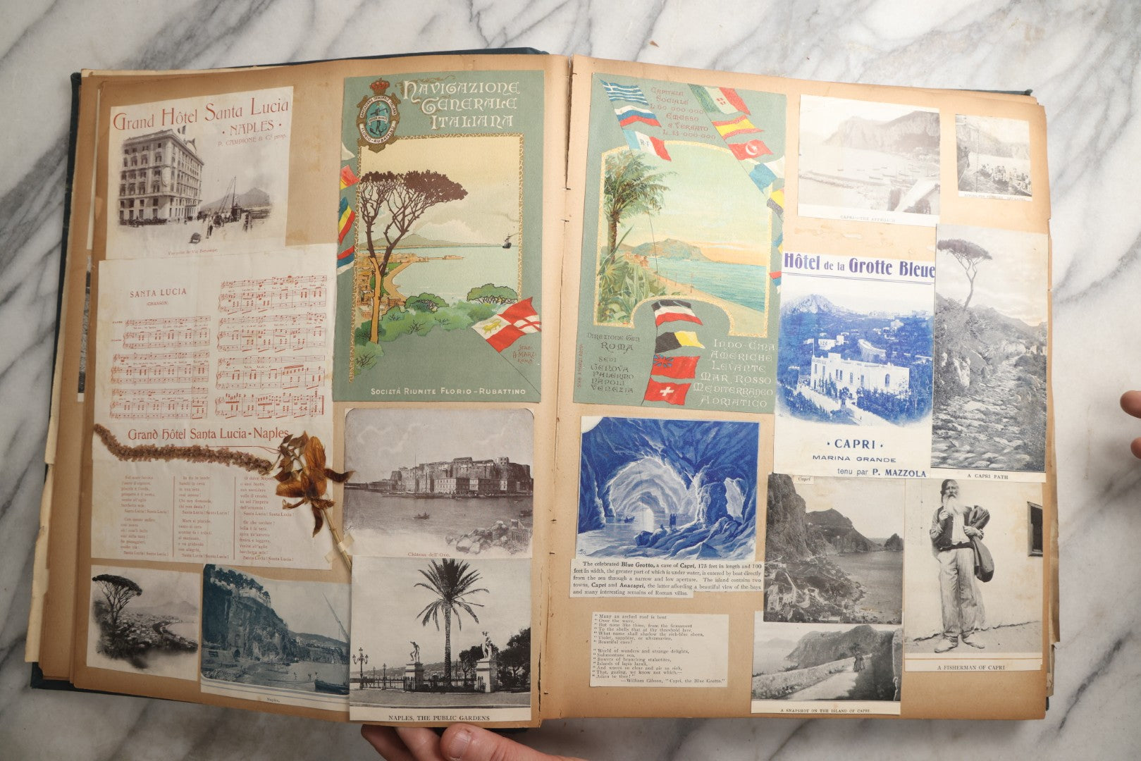 Lot 085 - Antique Blue Scrapbook Album With Gold Lettering, Gold Borders On Front Cover, Gold Lines On Spine, European Travel Ephemera Including Italy, Germany, England, Prague, Pressed Flowers Throughout, Patent March 1876, Circa 1906