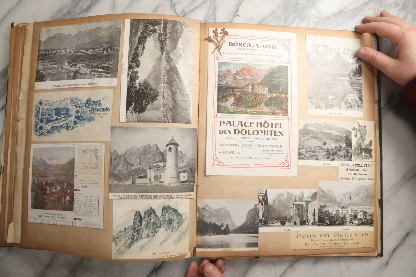 Lot 085 - Antique Blue Scrapbook Album With Gold Lettering, Gold Borders On Front Cover, Gold Lines On Spine, European Travel Ephemera Including Italy, Germany, England, Prague, Pressed Flowers Throughout, Patent March 1876, Circa 1906