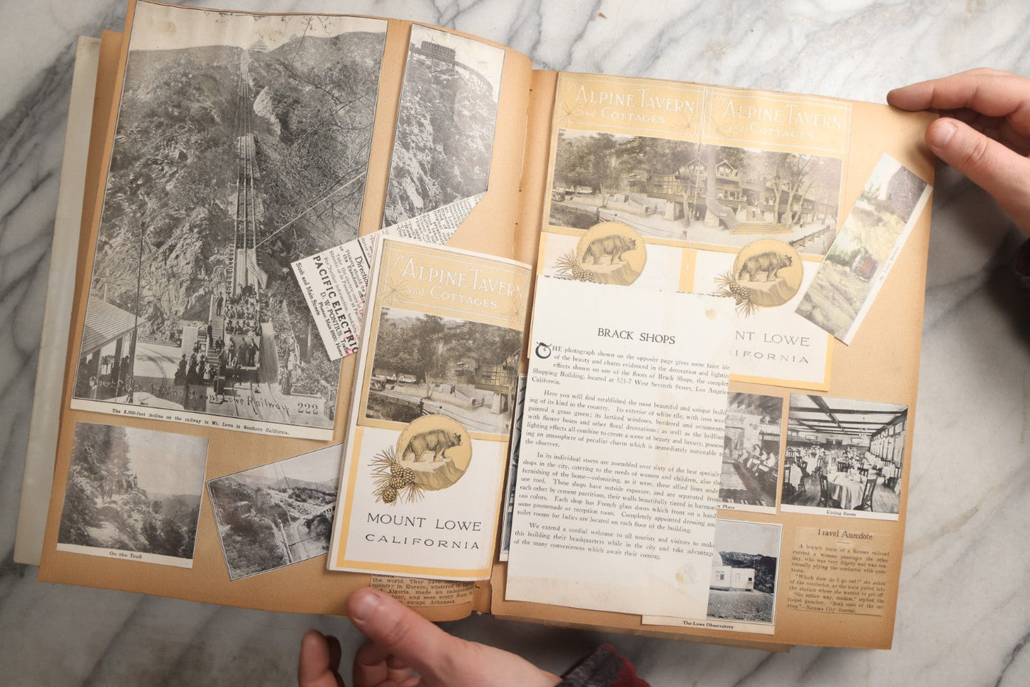 Lot 087 - Antique "The Nonpareil" Scrapbook Album With New Orleans, California, Arizona Ephemera, Pressed Flowers, 1914 Raja-Yoga Messenger Magazine, Patent March 1876, Heavy Water Staining, Warped Boards, Brittle Binding And Pages, Circa 1914