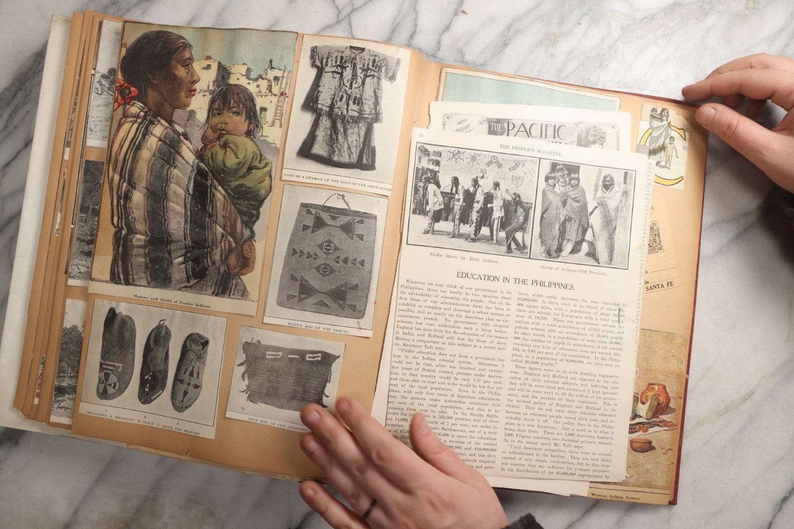 Lot 087 - Antique "The Nonpareil" Scrapbook Album With New Orleans, California, Arizona Ephemera, Pressed Flowers, 1914 Raja-Yoga Messenger Magazine, Patent March 1876, Heavy Water Staining, Warped Boards, Brittle Binding And Pages, Circa 1914