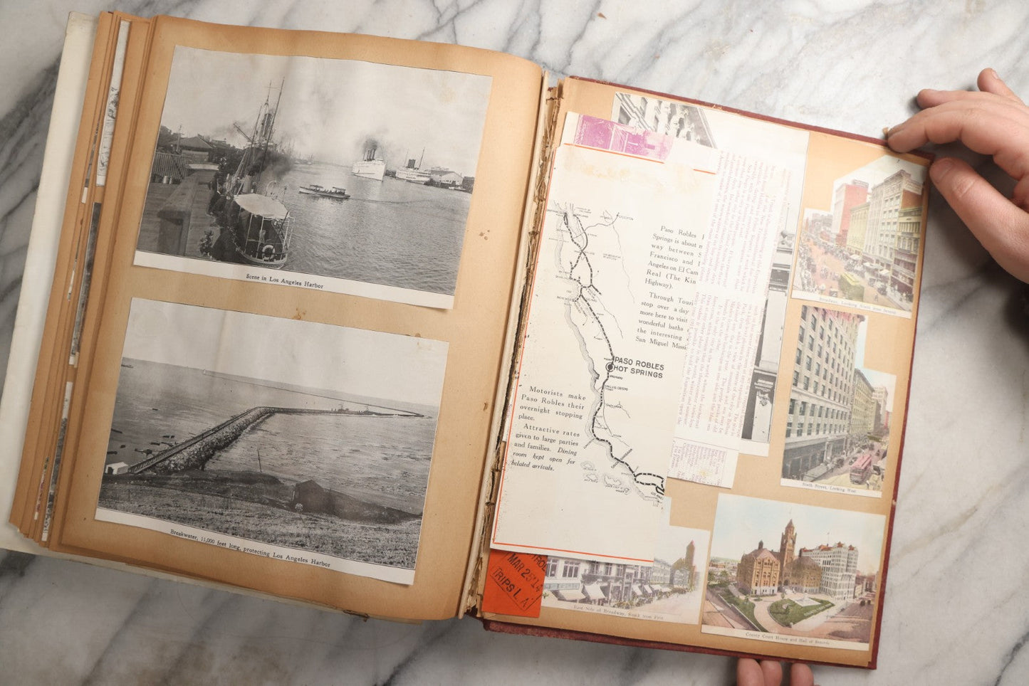 Lot 087 - Antique "The Nonpareil" Scrapbook Album With New Orleans, California, Arizona Ephemera, Pressed Flowers, 1914 Raja-Yoga Messenger Magazine, Patent March 1876, Heavy Water Staining, Warped Boards, Brittle Binding And Pages, Circa 1914