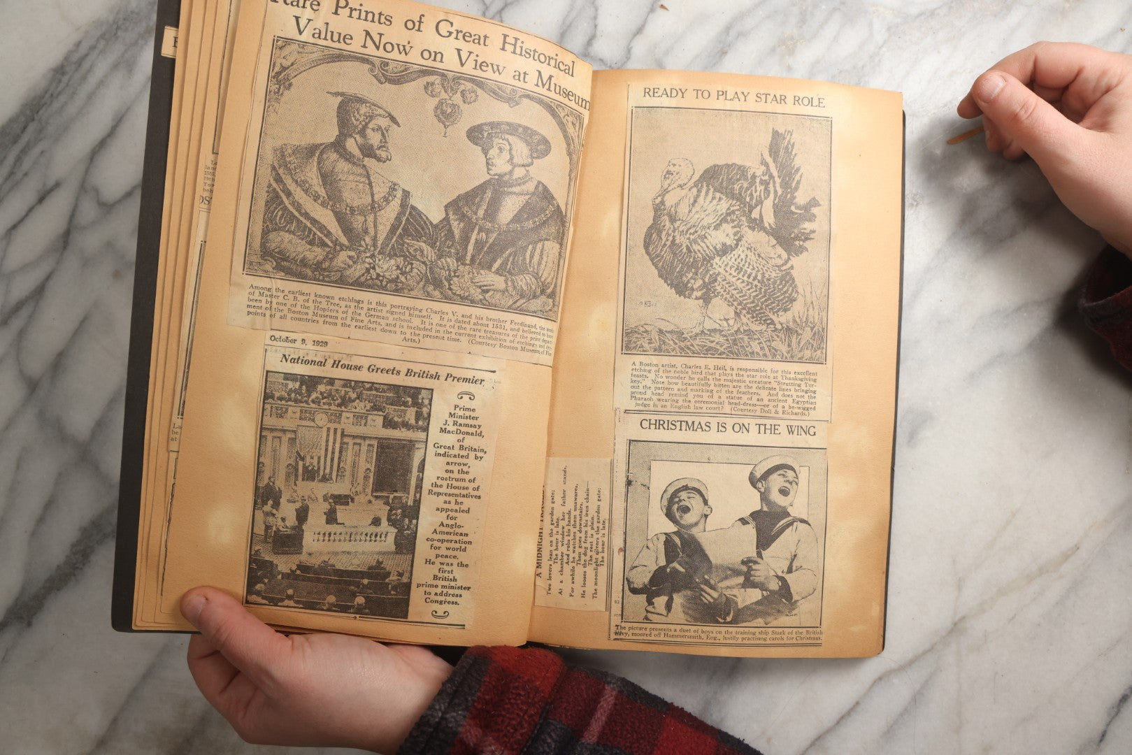 Lot 088 - Vintage Paperboard Scrapbook Album With Embossed Windmill Design, Politicians, Royalty, Popular Science, Events, And Lindbergh Family Newspaper Clippings, Circa 1930s