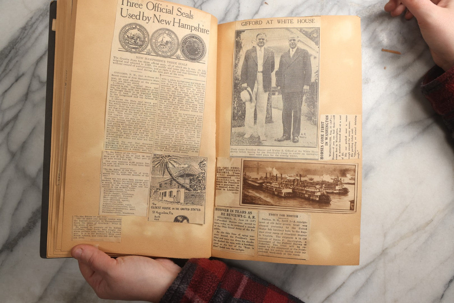 Lot 088 - Vintage Paperboard Scrapbook Album With Embossed Windmill Design, Politicians, Royalty, Popular Science, Events, And Lindbergh Family Newspaper Clippings, Circa 1930s