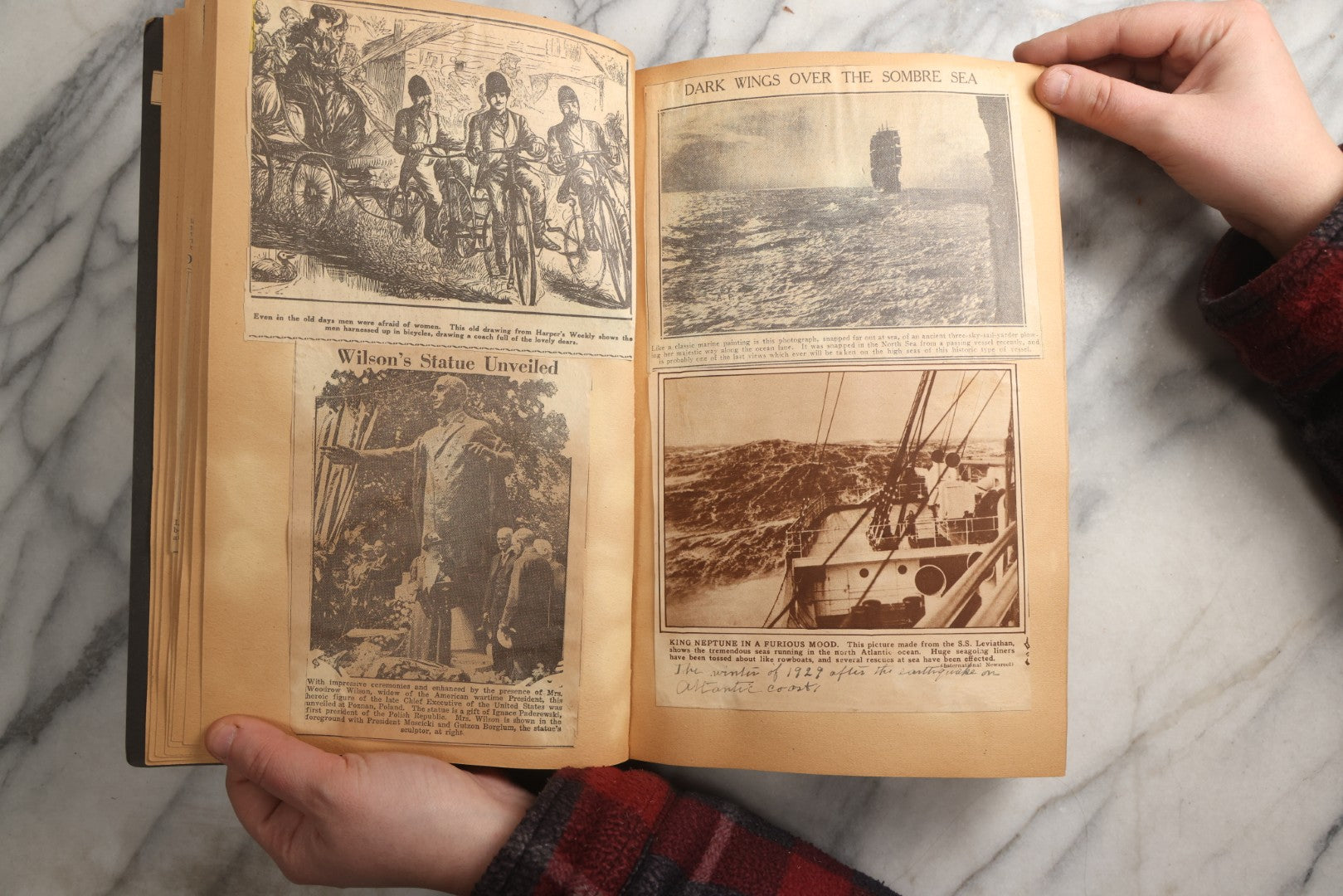 Lot 088 - Vintage Paperboard Scrapbook Album With Embossed Windmill Design, Politicians, Royalty, Popular Science, Events, And Lindbergh Family Newspaper Clippings, Circa 1930s