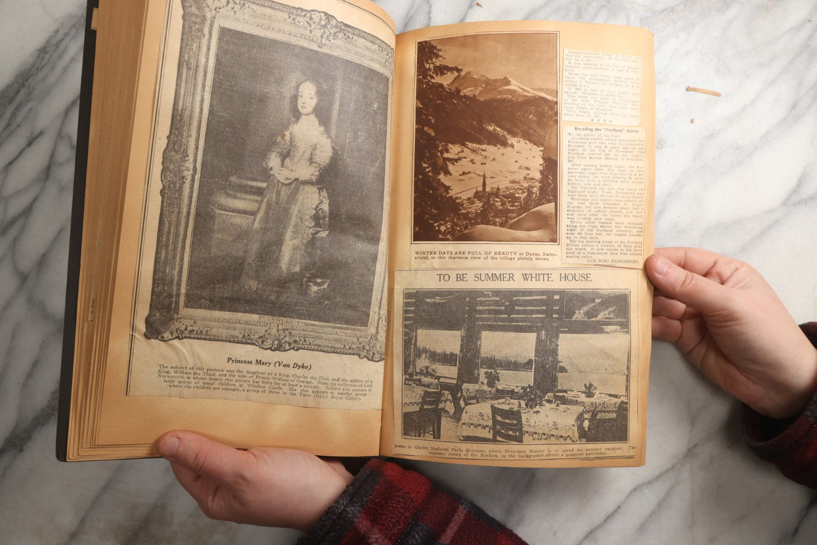 Lot 088 - Vintage Paperboard Scrapbook Album With Embossed Windmill Design, Politicians, Royalty, Popular Science, Events, And Lindbergh Family Newspaper Clippings, Circa 1930s