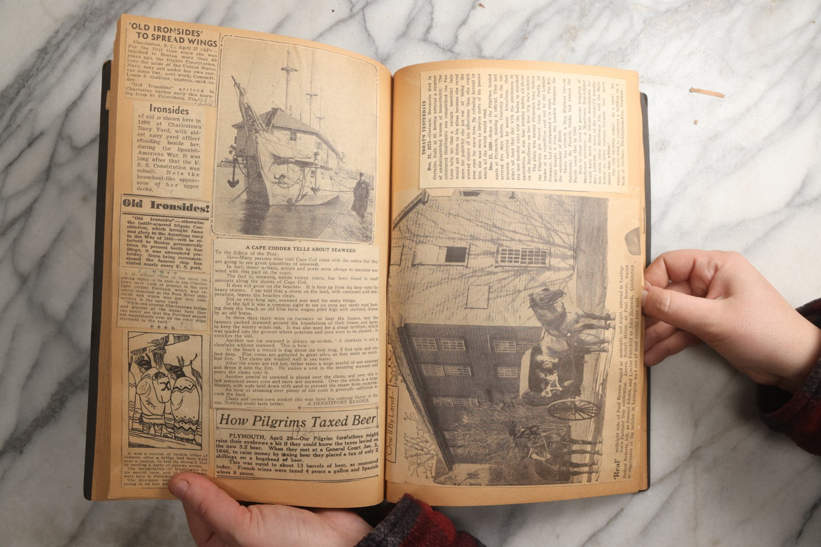 Lot 088 - Vintage Paperboard Scrapbook Album With Embossed Windmill Design, Politicians, Royalty, Popular Science, Events, And Lindbergh Family Newspaper Clippings, Circa 1930s