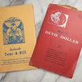 Lot 092 - Pair Of Vintage Berland's Magic Trick Folders Including Tear-A-Bill And Devil Dollar With Instructions, Props, And Envelopes, Completeness Not Verified