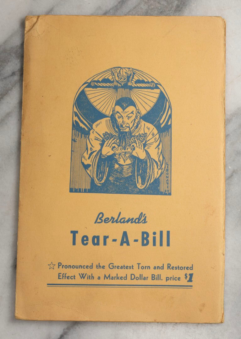 Lot 092 - Pair Of Vintage Berland's Magic Trick Folders Including Tear-A-Bill And Devil Dollar With Instructions, Props, And Envelopes, Completeness Not Verified