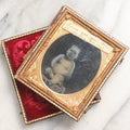Lot 100 - Antique 1/6th Plate Ambrotype Photograph Of Naked Baby, Identified As Laura, Aged 1 Year, September 5th, 1861, In Full Split Leatherette Case With Red Pillow, Trumansburg, New York