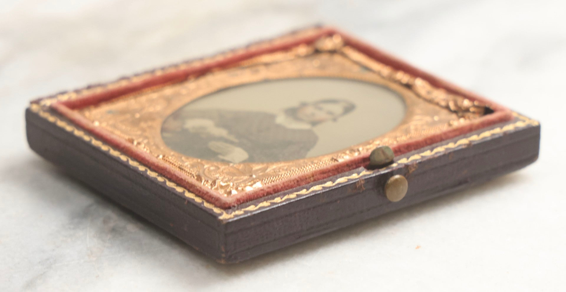 Lot 101 - Antique 1/9th Plate Ambrotype Photograph Of Teenage Girl Holding Object, Identified As Hattie A. Ellis, October 1862, Age 18, In Half Leatherette Union Case, With Geo. W. Clarke Studio Card, Boston, Massachusetts