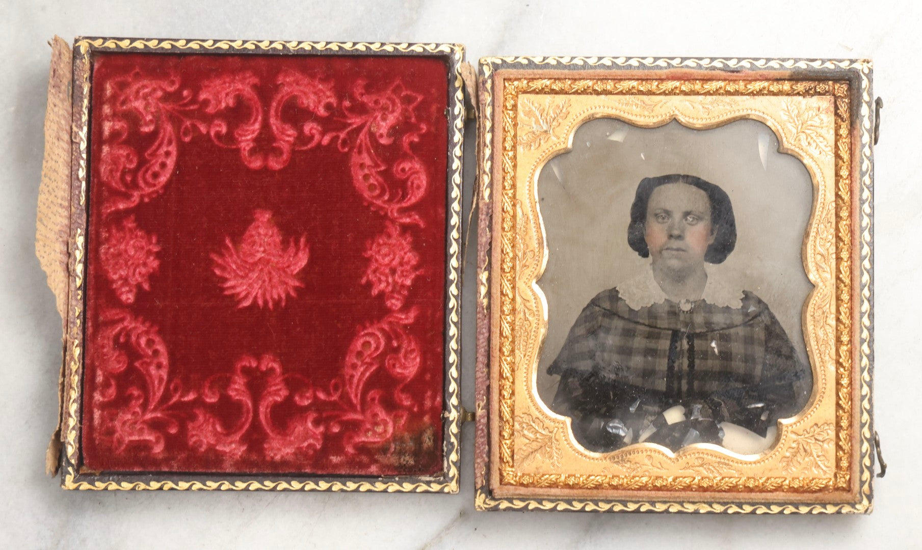 Lot 102 - Trio Of Antique Photographs Including 1/6th Plate Ruby Ambrotype Of Woman With Rosy Cheeks In Full Split Leatherette Case, 1/9th Plate Tintype Of Boy In Split Leatherette Case, And 1/9th Plate Tintype Of Woman With Mat And Preserver, No Case