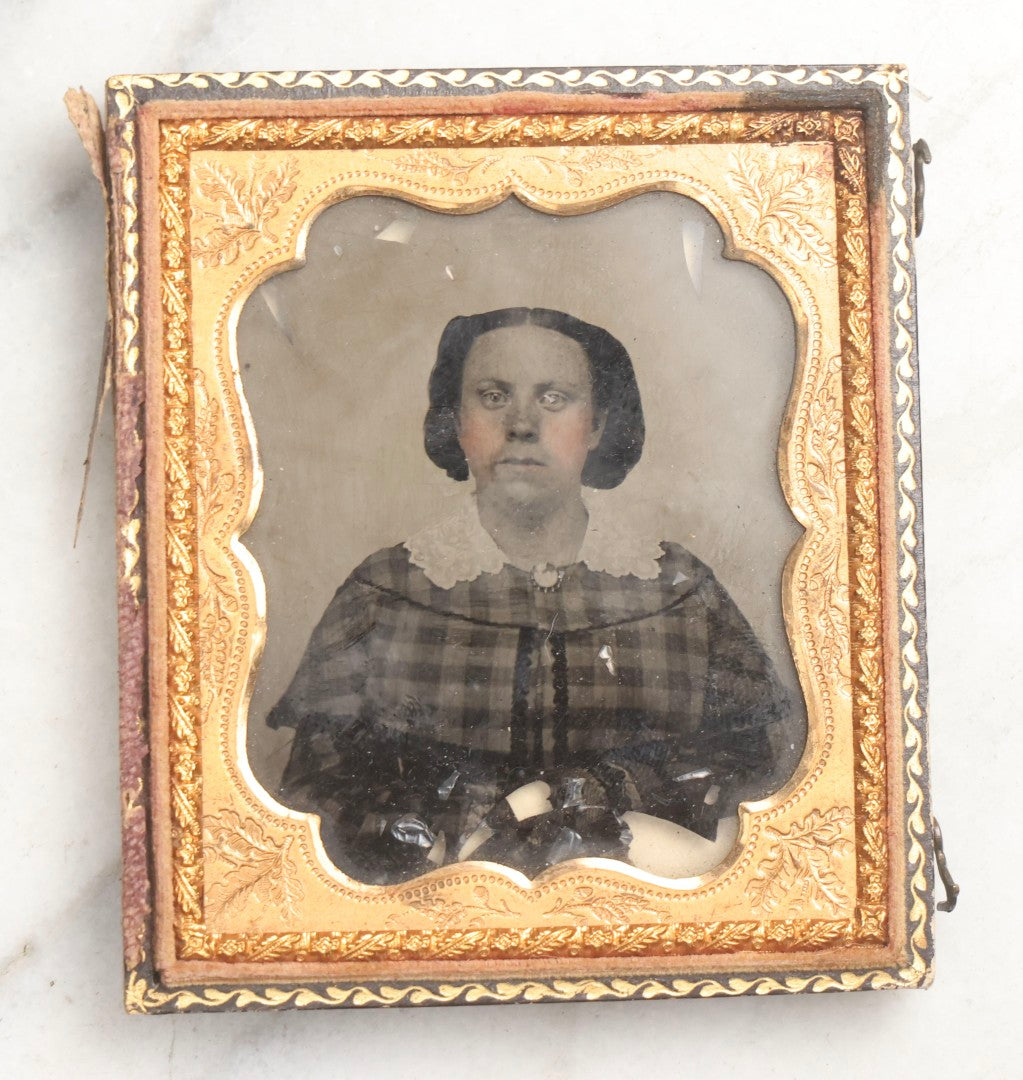Lot 102 - Trio Of Antique Photographs Including 1/6th Plate Ruby Ambrotype Of Woman With Rosy Cheeks In Full Split Leatherette Case, 1/9th Plate Tintype Of Boy In Split Leatherette Case, And 1/9th Plate Tintype Of Woman With Mat And Preserver, No Case