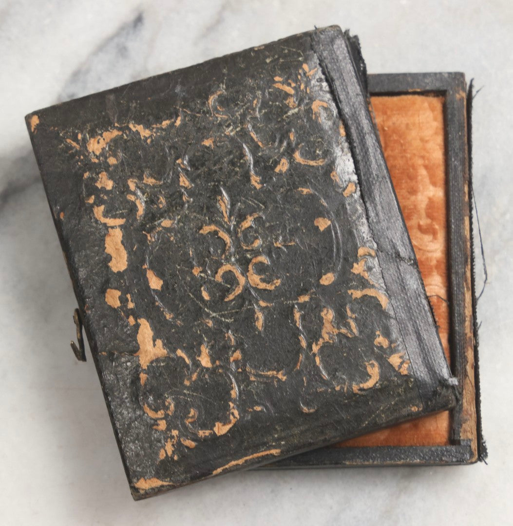 Lot 102 - Trio Of Antique Photographs Including 1/6th Plate Ruby Ambrotype Of Woman With Rosy Cheeks In Full Split Leatherette Case, 1/9th Plate Tintype Of Boy In Split Leatherette Case, And 1/9th Plate Tintype Of Woman With Mat And Preserver, No Case