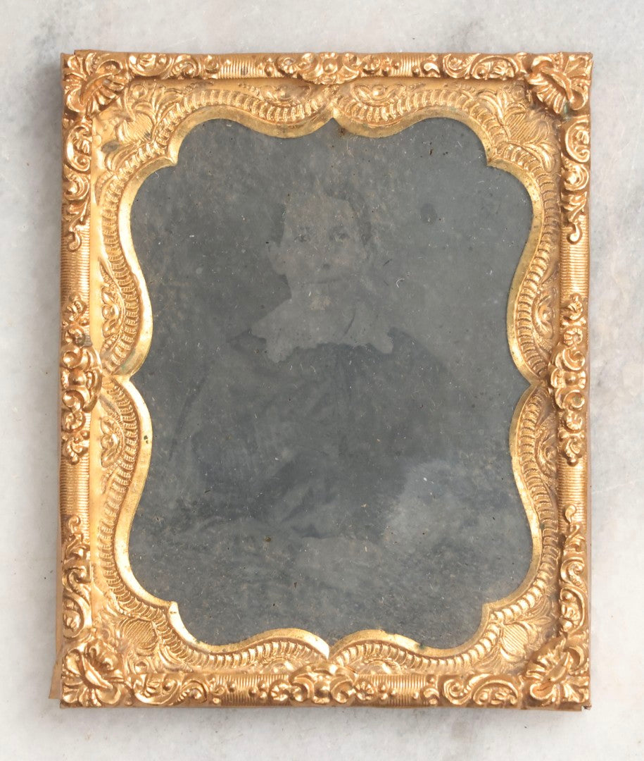 Lot 102 - Trio Of Antique Photographs Including 1/6th Plate Ruby Ambrotype Of Woman With Rosy Cheeks In Full Split Leatherette Case, 1/9th Plate Tintype Of Boy In Split Leatherette Case, And 1/9th Plate Tintype Of Woman With Mat And Preserver, No Case