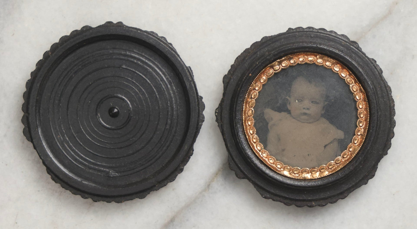 Lot 103 - Pair Of Antique Photographs Including Tintype Of Baby In Thermoplastic Screw-Top “Oreo” Case And Trimmed Carte De Visite C.D.V.. Of Boy In Brass Brooch Frame, Brooch Missing Pin On Back