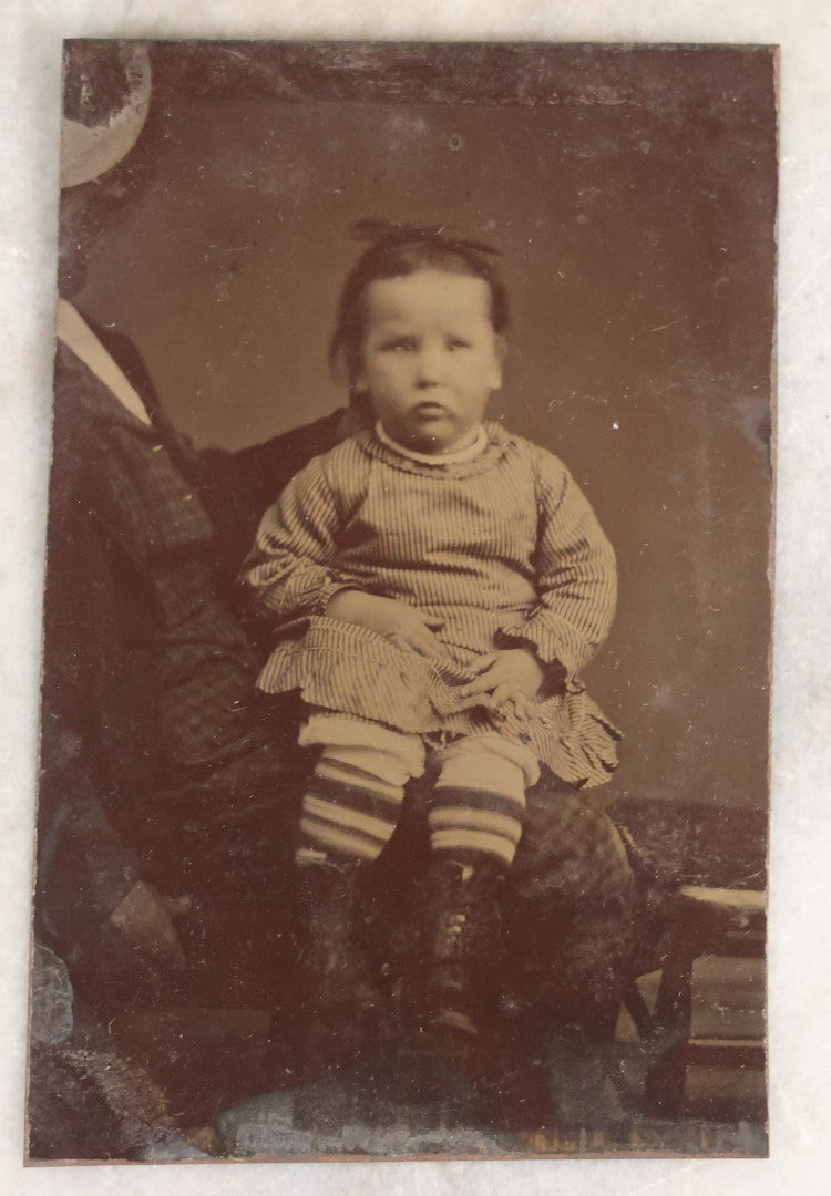 Lot 106 - Grouping Of Seven Antique “Not-So-Hidden Mother” Tintype Photographs Of Children With Mothers Or Assistants Conspicuously Visible In Shot, Including Examples With Striped Covering, Dark Curtain, Motion Blur, And More