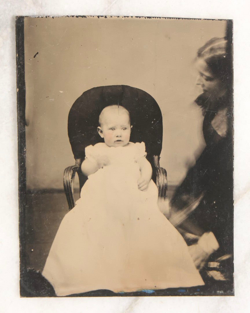 Lot 106 - Grouping Of Seven Antique “Not-So-Hidden Mother” Tintype Photographs Of Children With Mothers Or Assistants Conspicuously Visible In Shot, Including Examples With Striped Covering, Dark Curtain, Motion Blur, And More