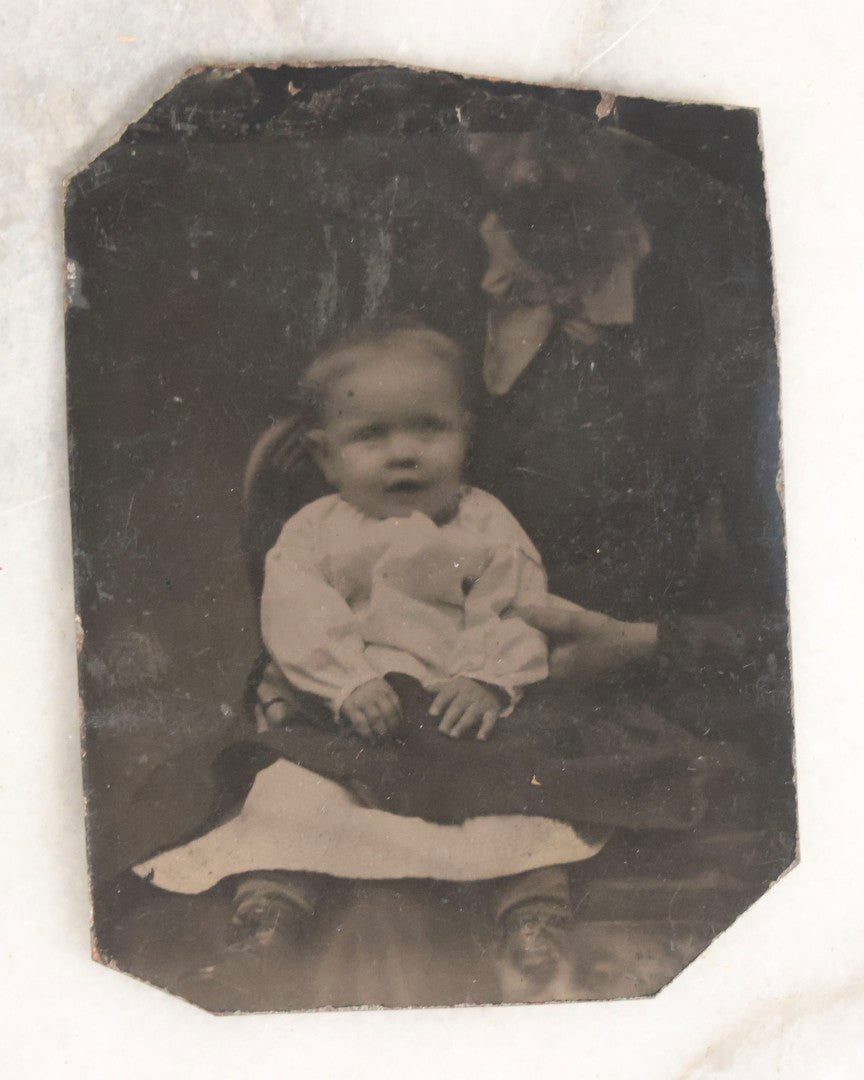 Lot 106 - Grouping Of Seven Antique “Not-So-Hidden Mother” Tintype Photographs Of Children With Mothers Or Assistants Conspicuously Visible In Shot, Including Examples With Striped Covering, Dark Curtain, Motion Blur, And More