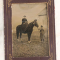 Lot 109 - Antique Near Half Plate Tintype Photograph Of Two Girls With Horse In Outdoor Scene, One Seated Horseback And One Holding Lead, Barn In Background, In Black Paper Frame