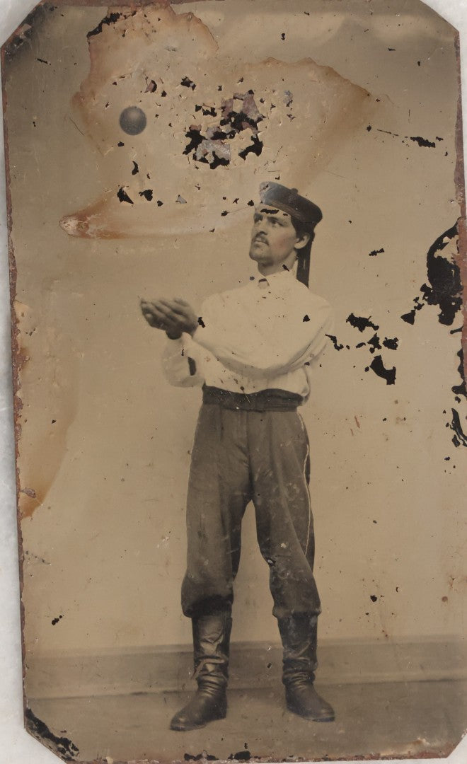Lot 116 - Antique Tintype Photograph Of Male Performer With Ball Suspended Above Outstretched Hands, Likely Supported By Hidden String To Create Illusion