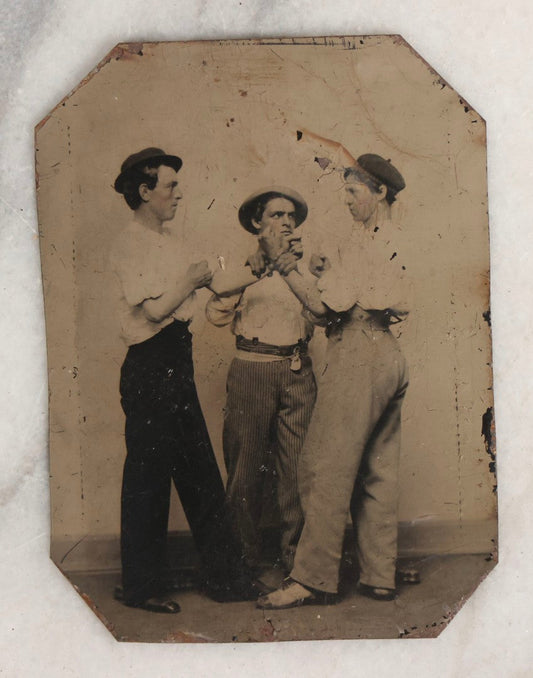 Lot 117 - Antique Tintype Photograph Of Three Young Men Staging Fisticuffs Scene, Two Squaring Off With Clenched Fists And Third Acting As Referee, All Wearing Hats