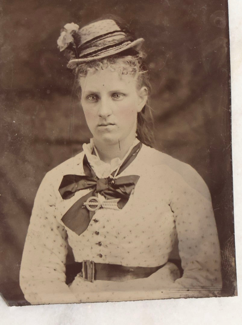 Lot 119 - Grouping Of 18 Antique Tintype Photographs Including Multiple Portraits Of Gruff Mustached Man In Cap, Woman Holding Book, Annoyed Teenage Girl In Small Hat, Family Of Five, Very Old Bearded Man, And Handsome Young Man In Cap