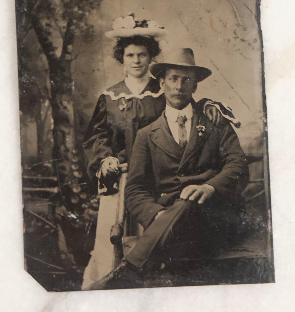 Lot 119 - Grouping Of 18 Antique Tintype Photographs Including Multiple Portraits Of Gruff Mustached Man In Cap, Woman Holding Book, Annoyed Teenage Girl In Small Hat, Family Of Five, Very Old Bearded Man, And Handsome Young Man In Cap