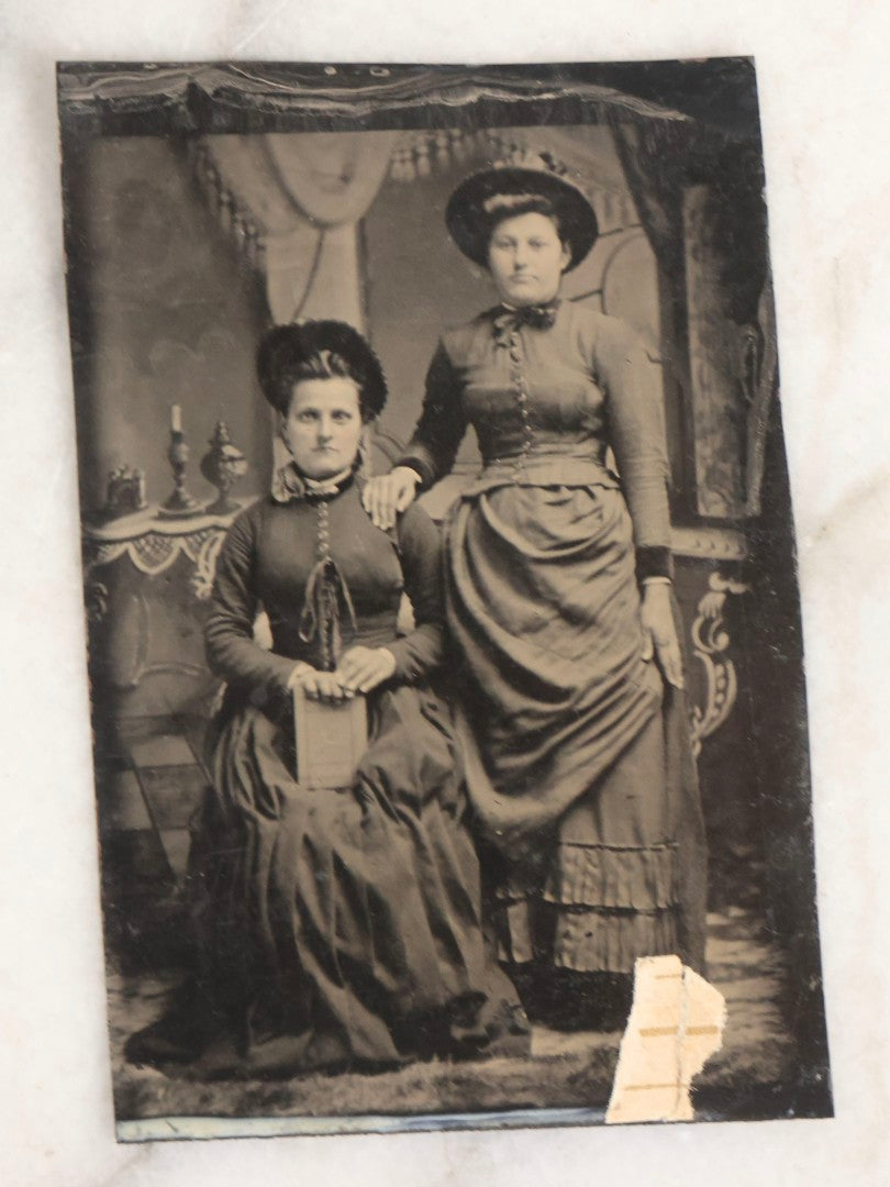 Lot 119 - Grouping Of 18 Antique Tintype Photographs Including Multiple Portraits Of Gruff Mustached Man In Cap, Woman Holding Book, Annoyed Teenage Girl In Small Hat, Family Of Five, Very Old Bearded Man, And Handsome Young Man In Cap