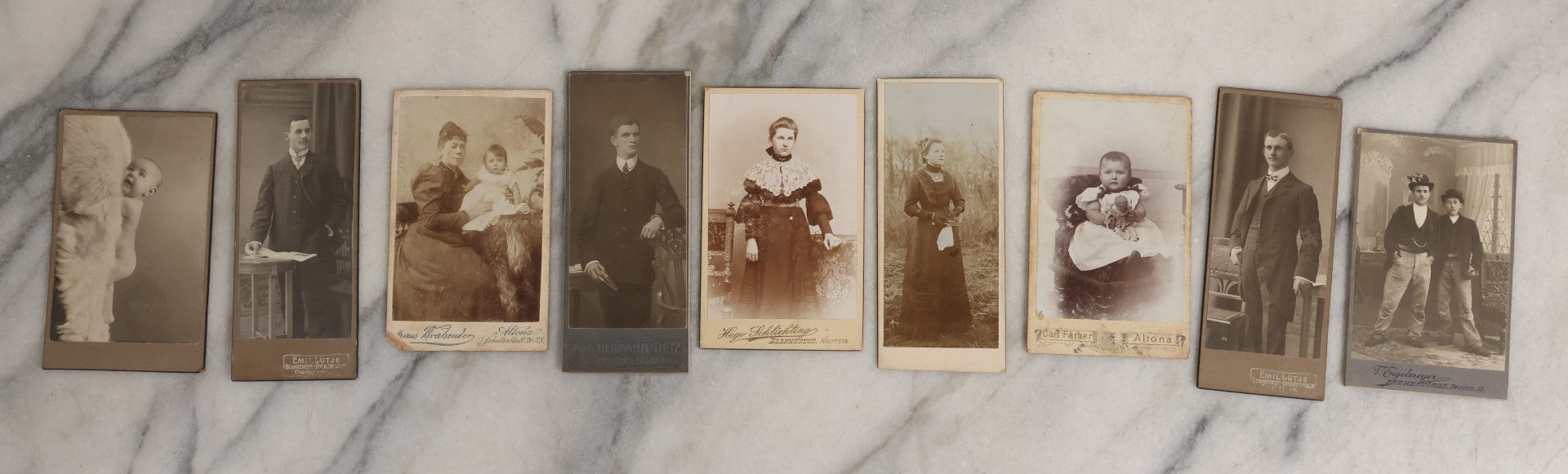 Lot 126 - Grouping Of Nine Antique German Carte De Visite C.D.V.. Photographs Including Girl With Doll, Naked Baby, Young Men In Bowler Hats, And Unusual Narrow C.D.V.. Formats