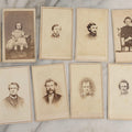 Lot 127 - Grouping Of Eleven Antique Carte De Visite C.D.V.. Photographs Including Hand-Colored Portrait Of Young Girl In Traditional Dress, Boy In Chair, Girl In Dress, And Multiple Men's Portraits