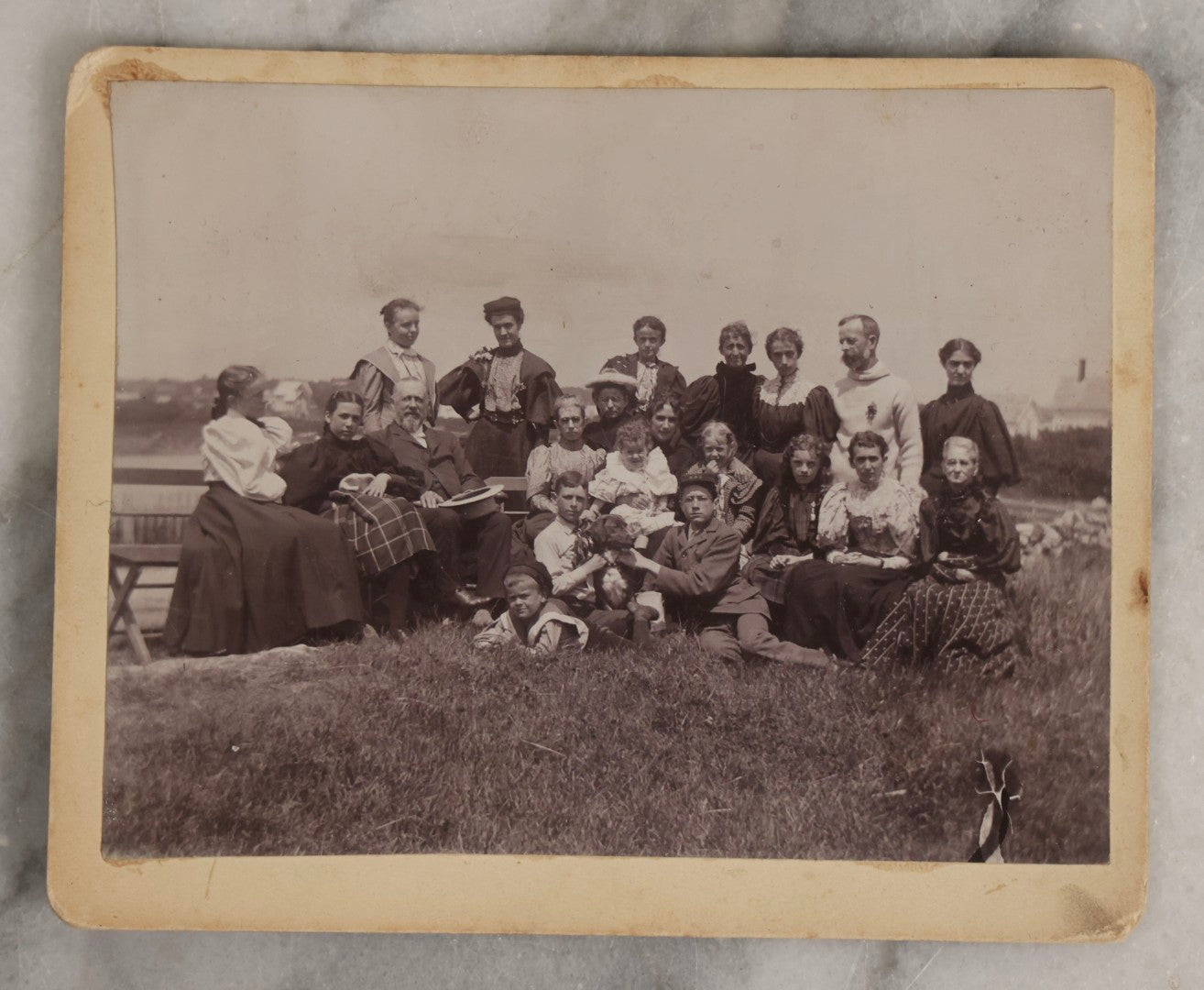 Lot 128 - Grouping Of Five Antique Outdoor Boarded Photographs, Victorian Era, Including Woman Fishing July 1896; Three Women Seated On Rocky Shore; Large Group With Dog June 1896; Ladies Posed On Porch Of “Chase Cabin”; And Group With Dog